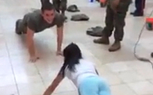 Young girl beats army cadet in push-up challenge