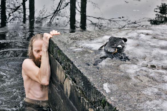 This Man Has A Very Sweet Reason For Jumping Into A Frozen Lake