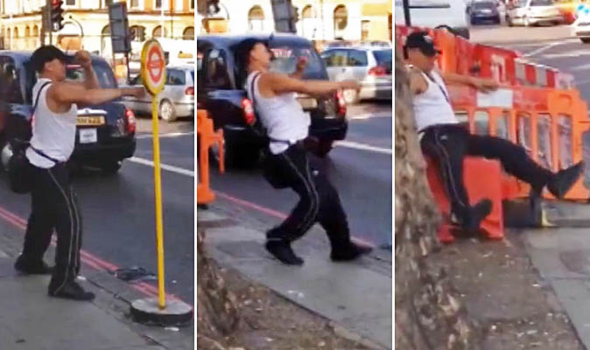 WATCH: Boozy bloke enters bitter brawl - with bus stop sign